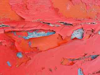 Paint peeling off a boat.